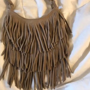 Lightly used grey fringe crossbody